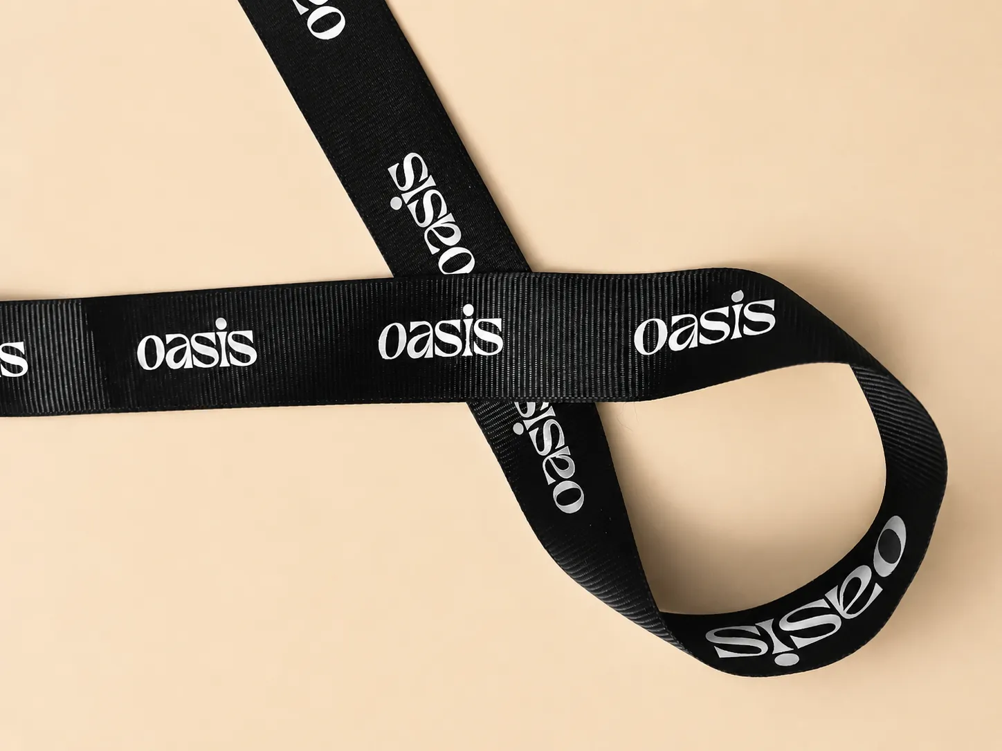 Close-up of printed branded ribbon used in luxury packaging
