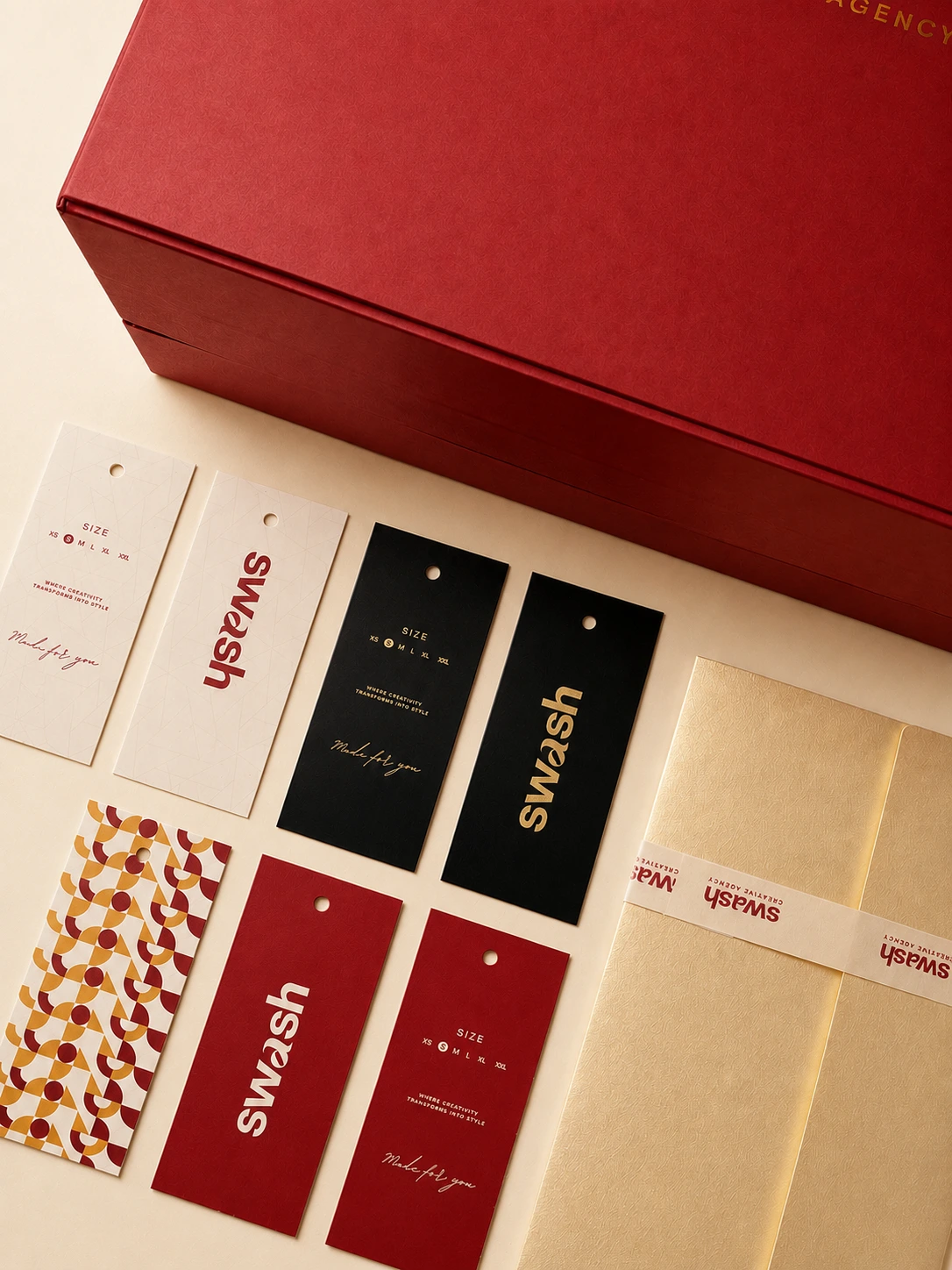 Complete custom packaging system with rigid box, branded card and hang tag