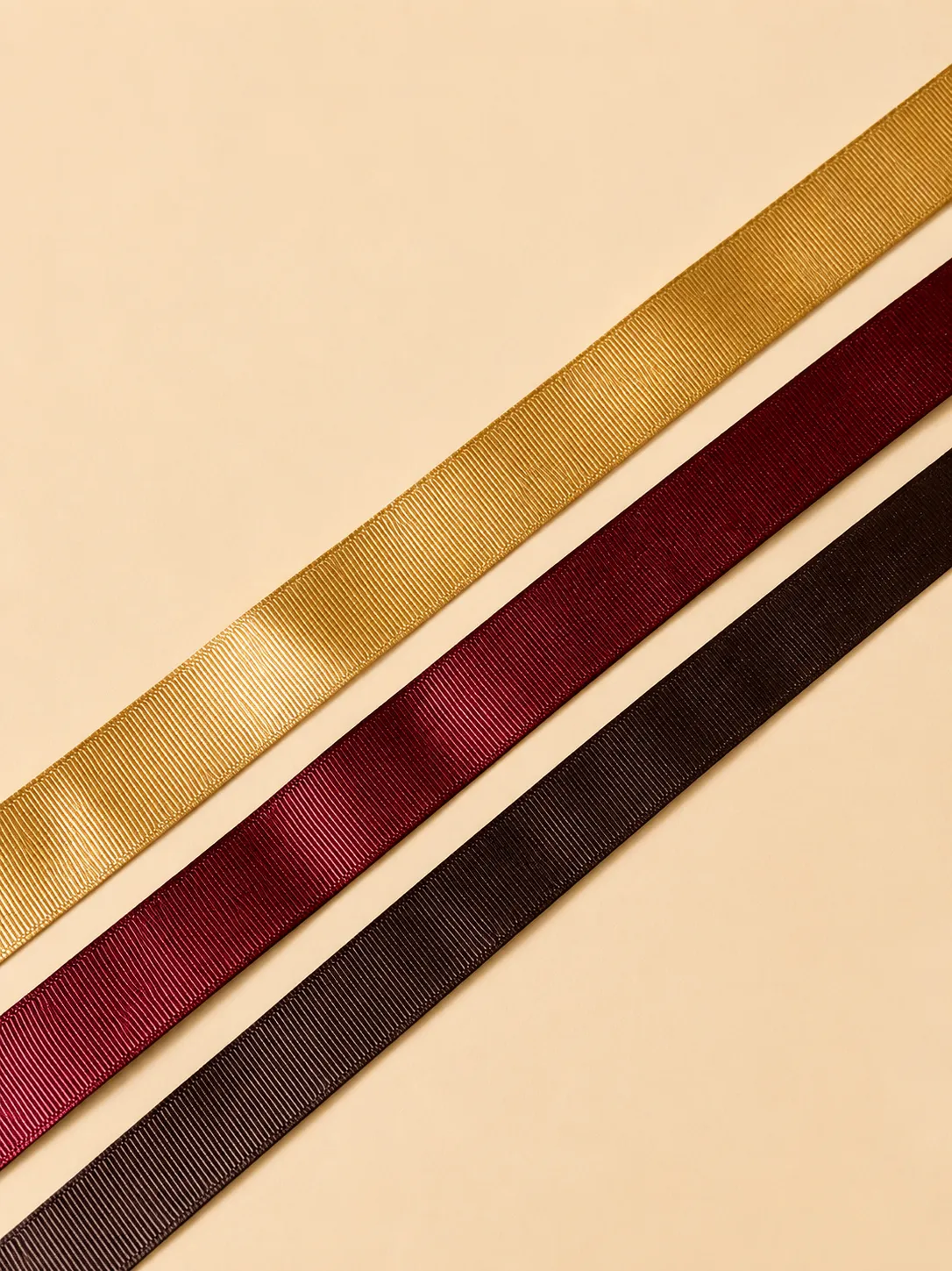 Close-up of printed branded ribbon used in luxury packaging