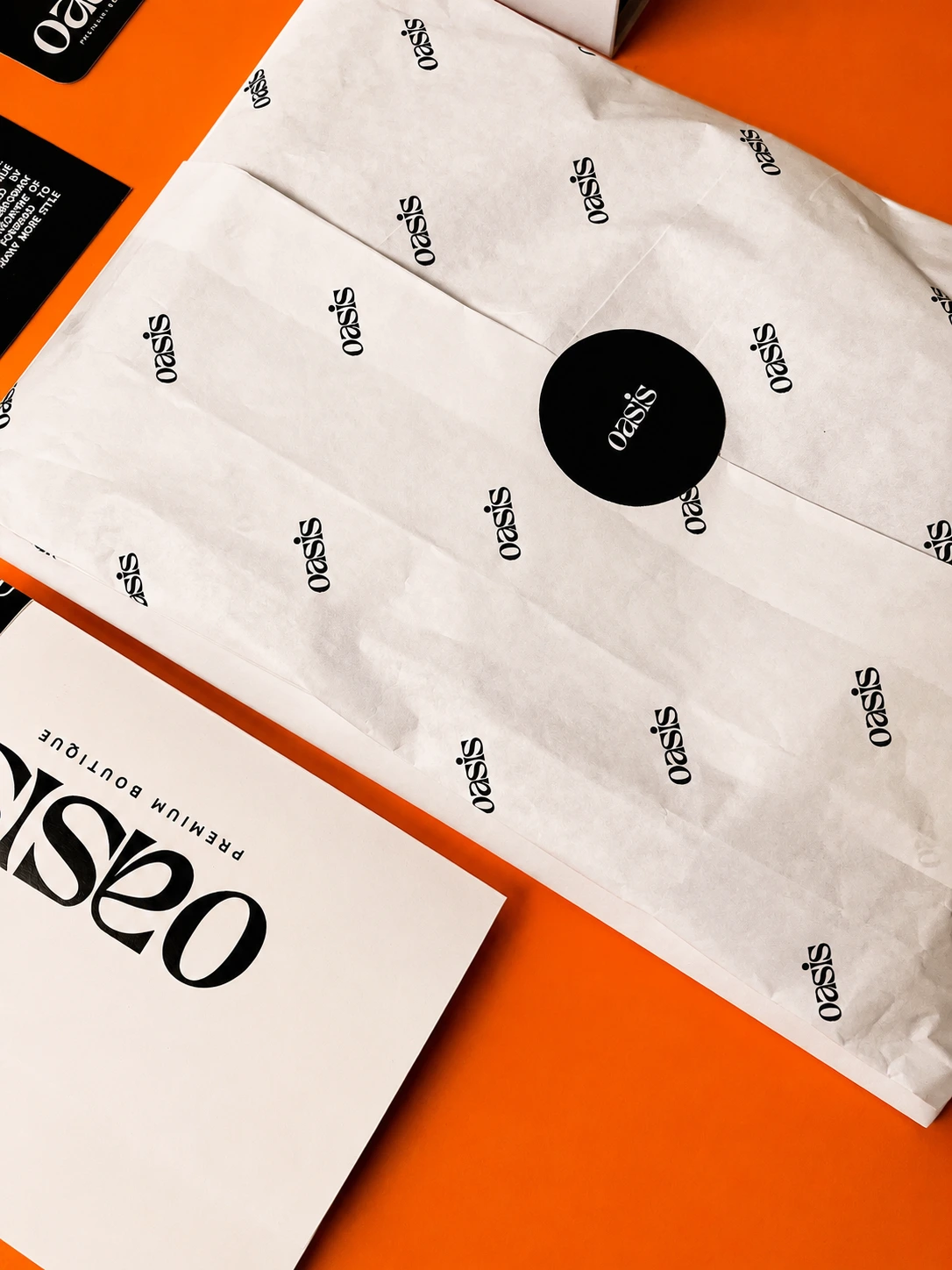Branded tissue paper finished with a custom sticker seal